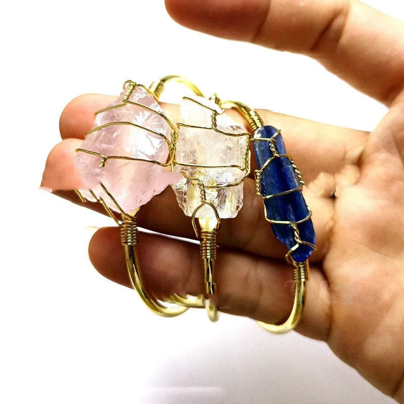 Natural crystal rough stone bracelet with geometric unshaped design and gold winding metal accents