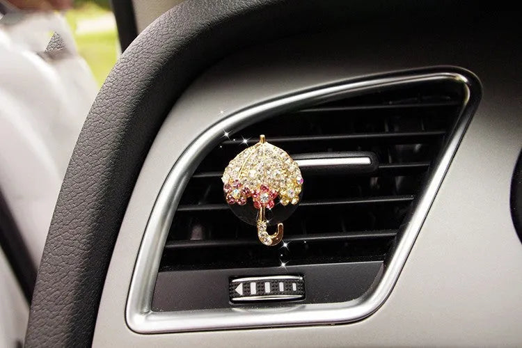 Alloy car air vent fragrance clip measuring 6.3cm with decorative handbag design