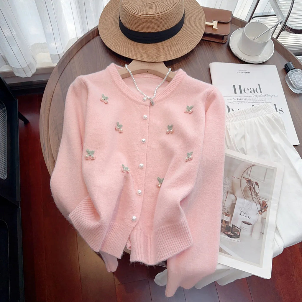 Cashmere blend cardigan with beaded detailing in slim fit silhouette, available in pink, red, white, and blue colours
