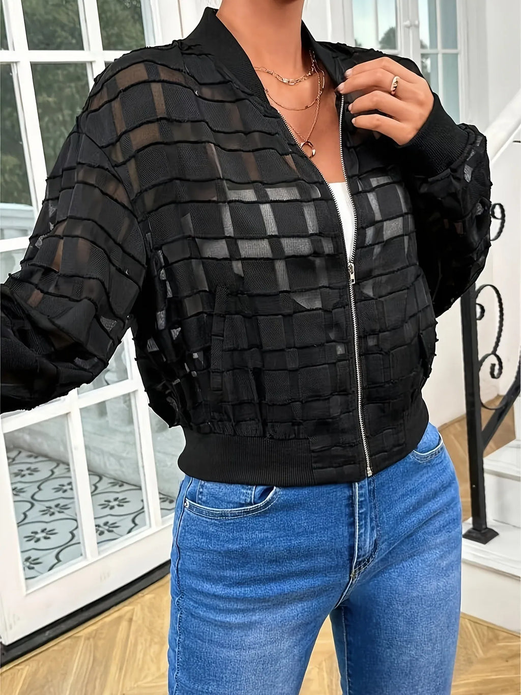 Black women's semi-transparent jacket with geometric pattern, zipper, and long sleeves for casual wear