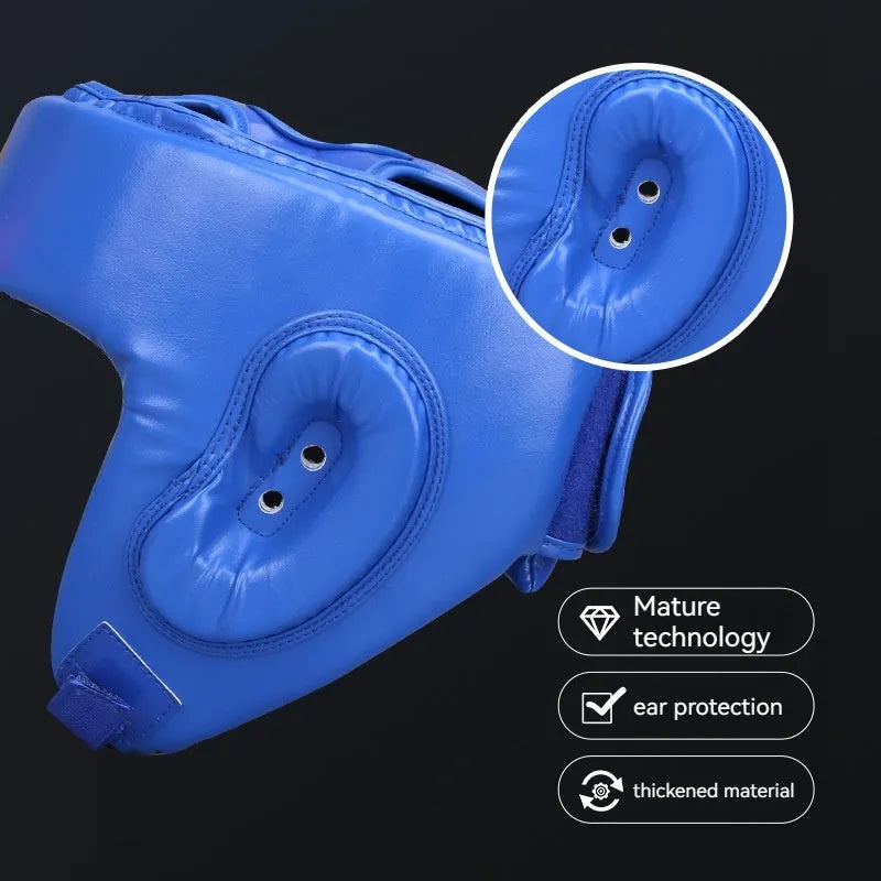 Red fully enclosed boxing helmet with jaw protection showing vertical ventilation design