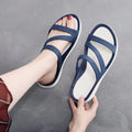 Women's solid colour casual sandals with a breathable PP upper, shown in red.