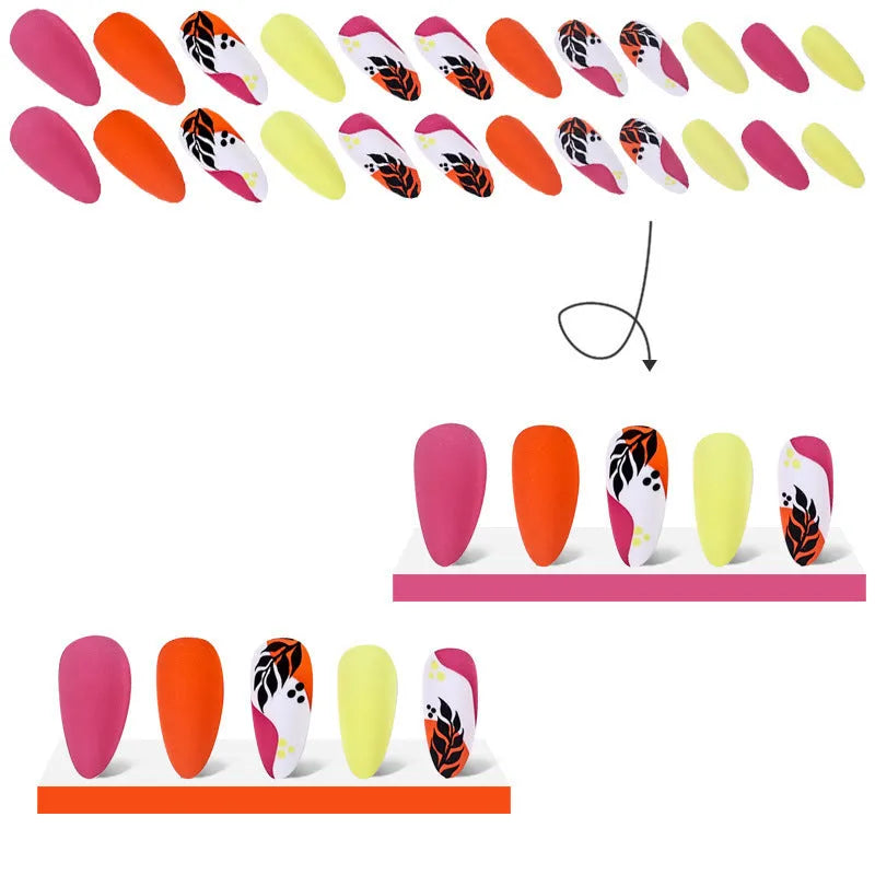 Wear Armour medium almond nail stickers with frosted tulip pattern in four designs: French leaves, leopard print, plating, and macaron