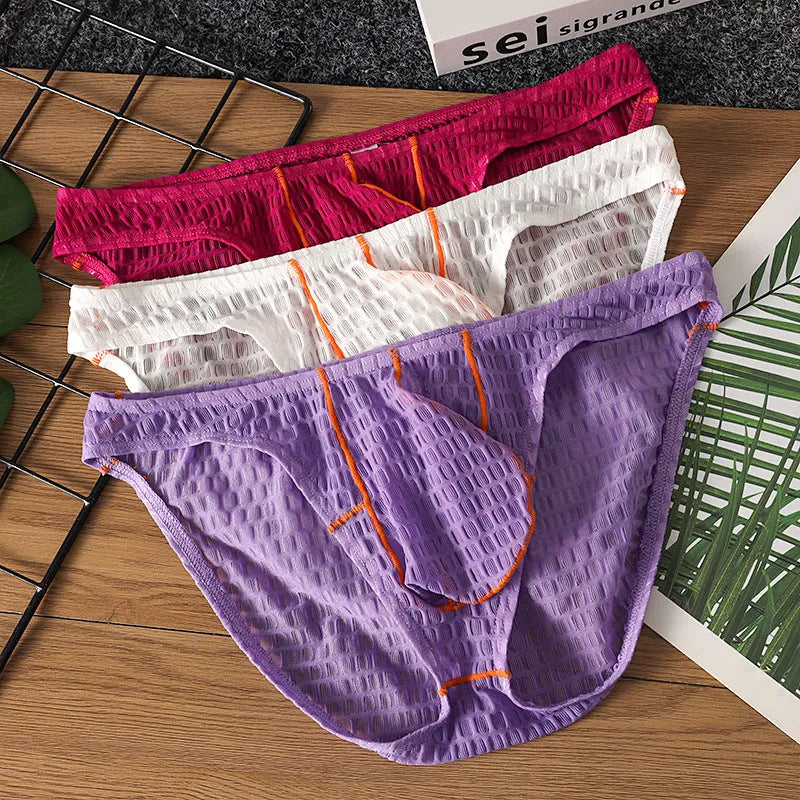 Men's solid colour low waist lace briefs for sports in white, black, green, rose red, and light purple.