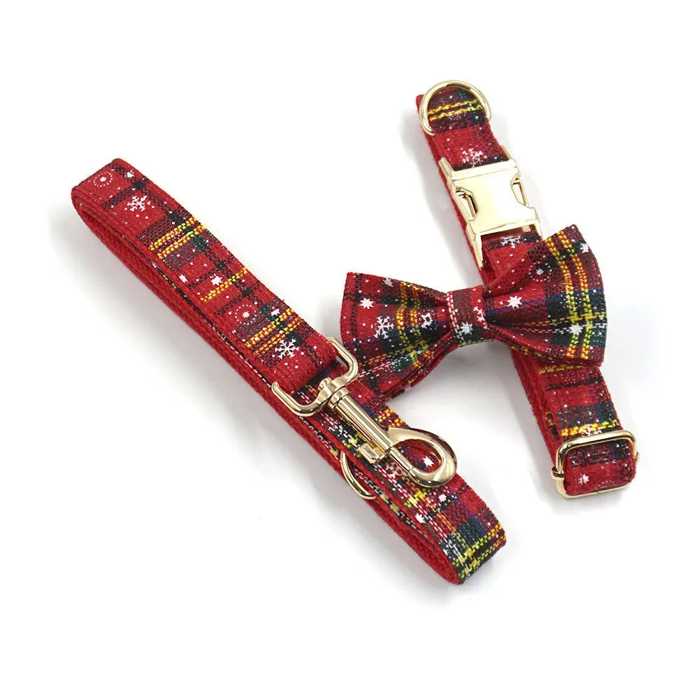 Red Christmas pet collar set with matching traction rope, bow, chest back, and stool bag accessories