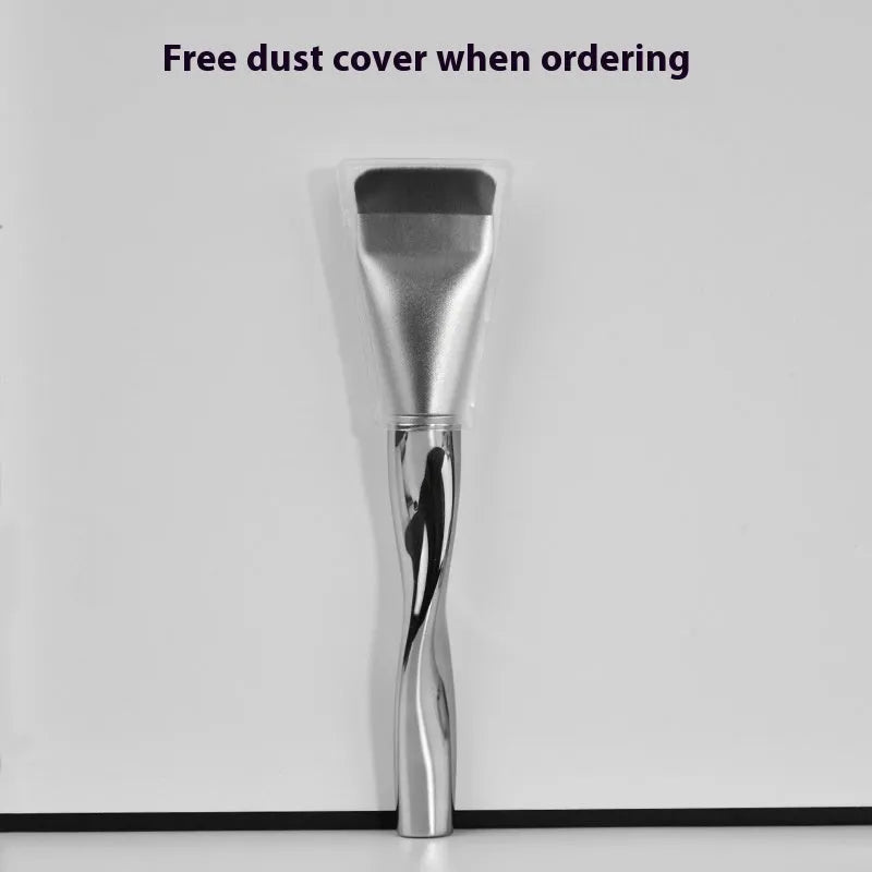 Spiral-shaped black powder foundation brush with long handle and separate makeup puff in packaging