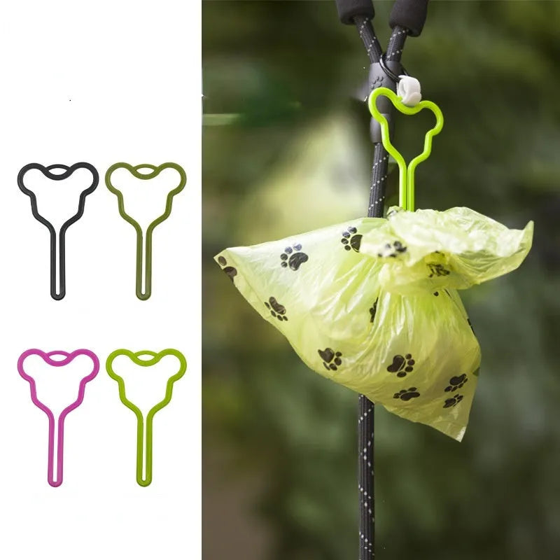 Pet poop bag holder with hands-free clip and adjustable Velcro strap, holding multiple bags for dog walking