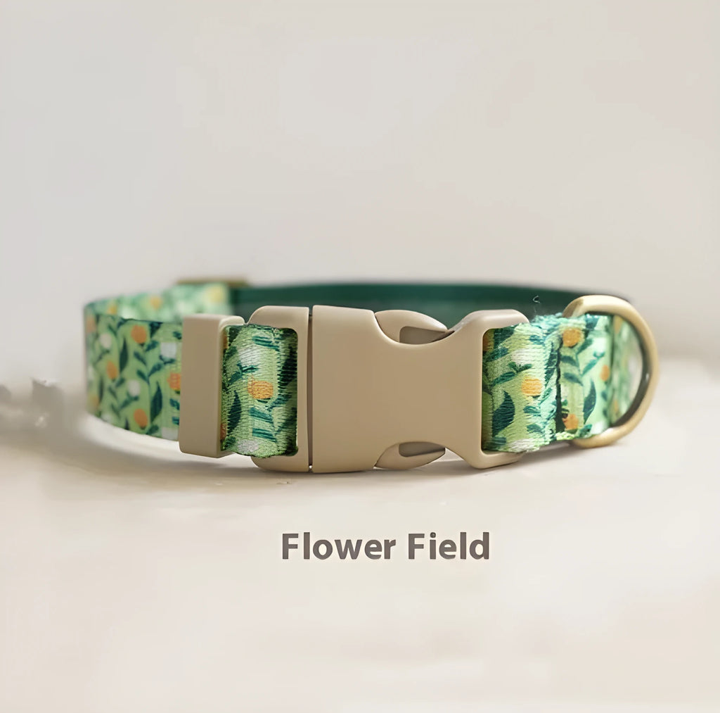 Flower patterned nylon pet collar in Hanada colour, showing adjustable fastening and floral design detail.