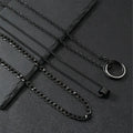 Black three-piece stainless steel men's necklace set with titanium steel cylindrical ring pendant