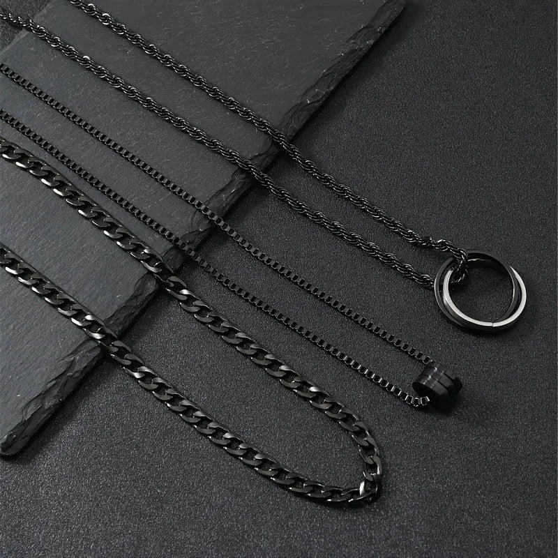 Black three-piece stainless steel men's necklace set with titanium steel cylindrical ring pendant
