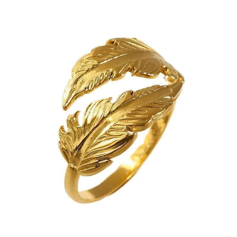 Women's adjustable opening feather fashion ring in silver or gold colour on titanium steel.