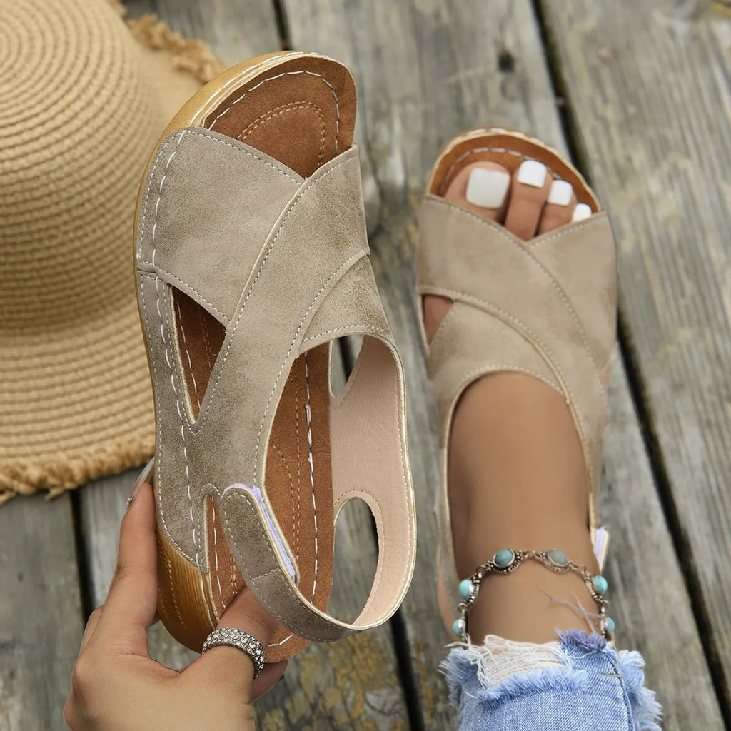 Women's brown Roman platform sandals with an ankle skirt and Velcro strap