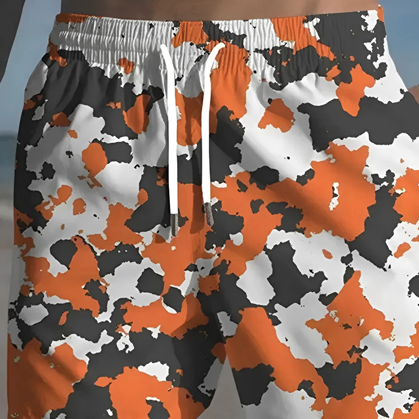 Men's elastic polyester beach shorts in printed streetwear design for travel and swim