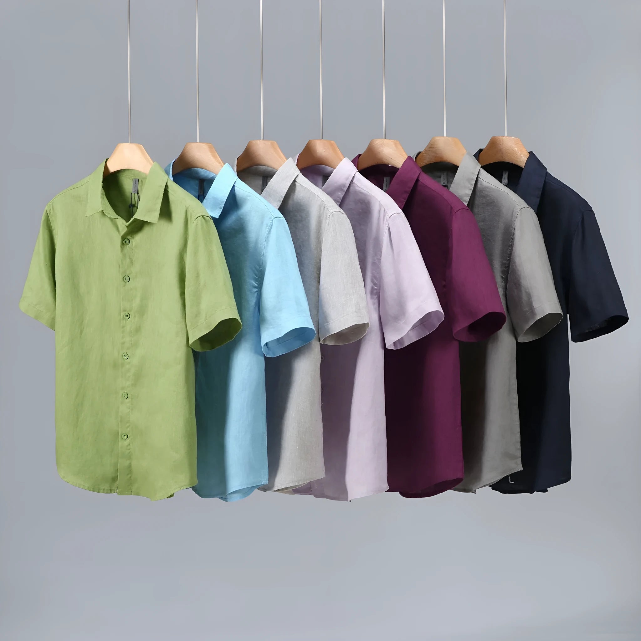 Men's grey linen short-sleeved casual shirt with a regular fit and cardigan style on a hanger