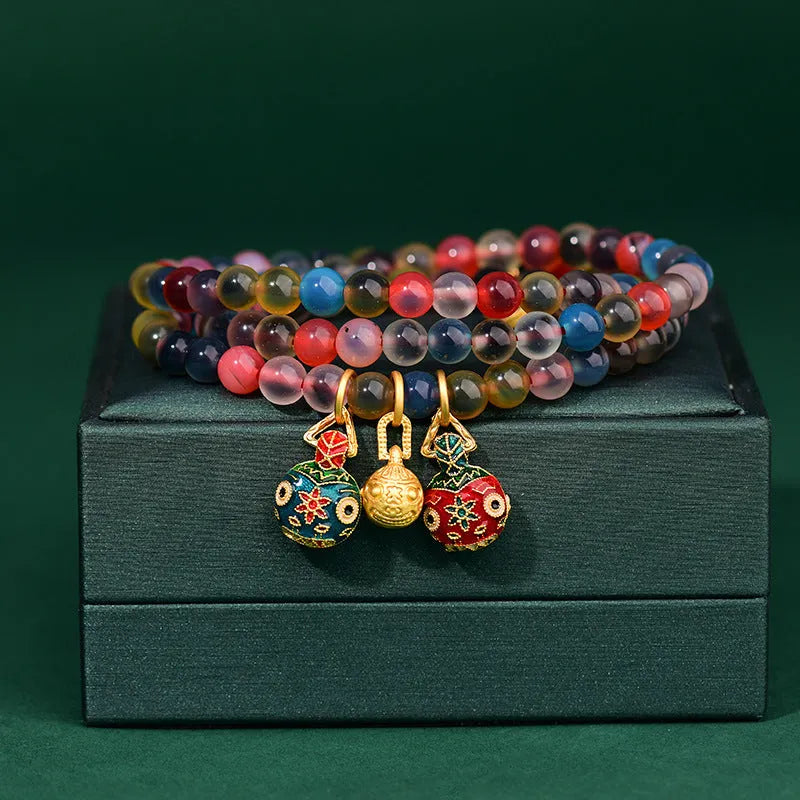 Handmade Dzogchen Agate bracelet with Sugar Heart Fragrant Gray glaze and Swallowing Gold Beast detail.
