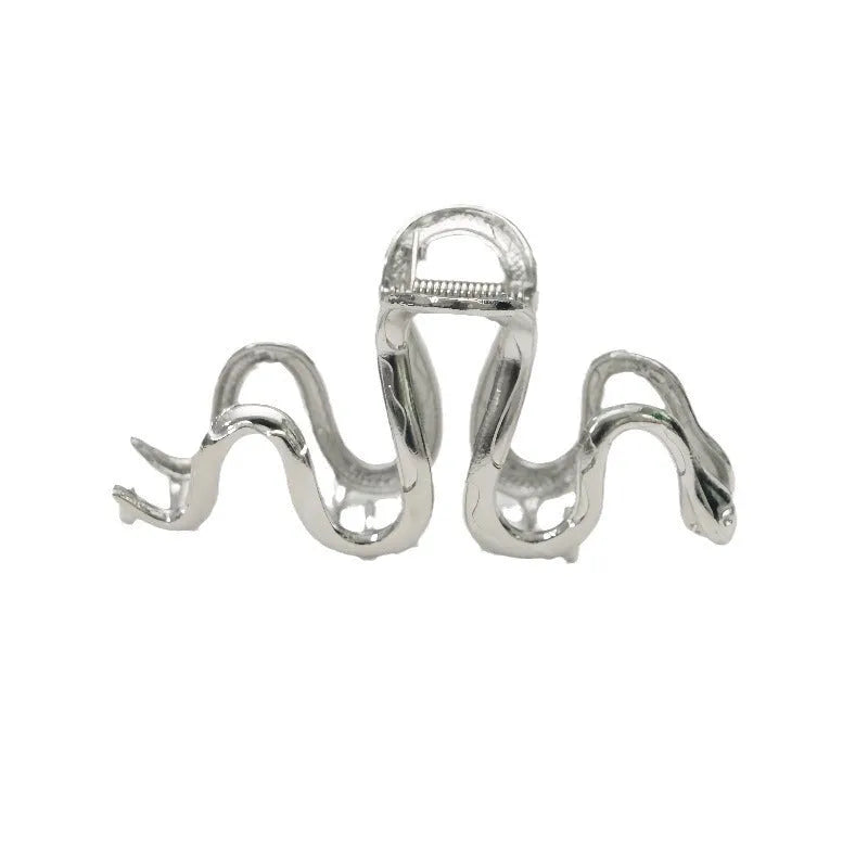 Slytherin serpentine metal hair barrette in silver or gun black, 10.5 cm long.