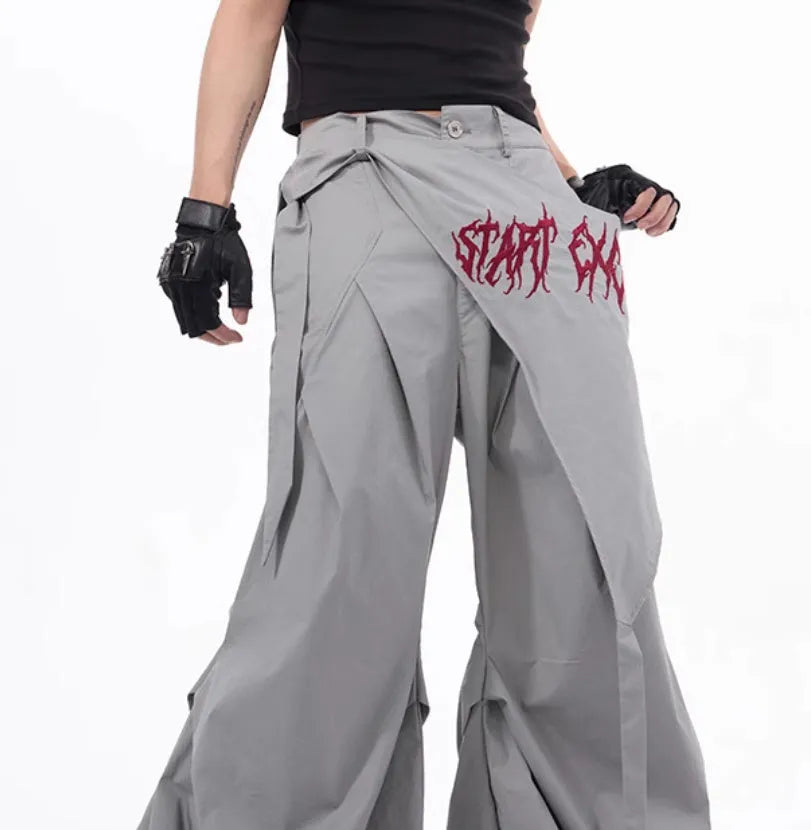 Boy modelling black wide-leg Korean-style summer trousers.