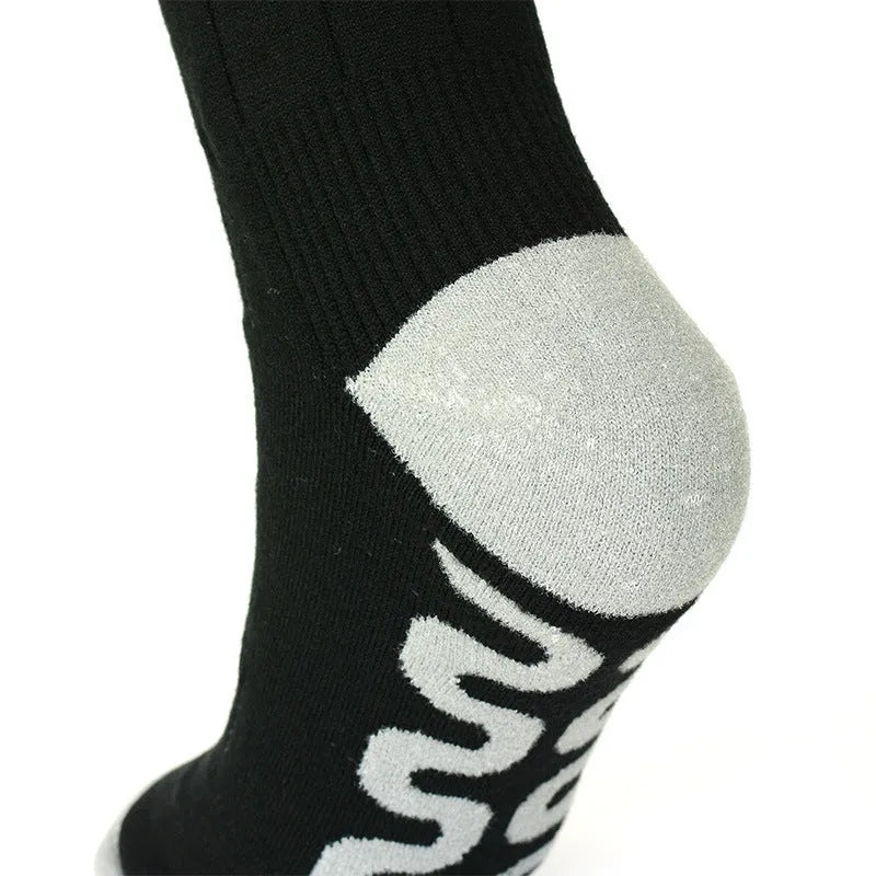 Smart app controlled heated socks with USB charging cable and battery pack