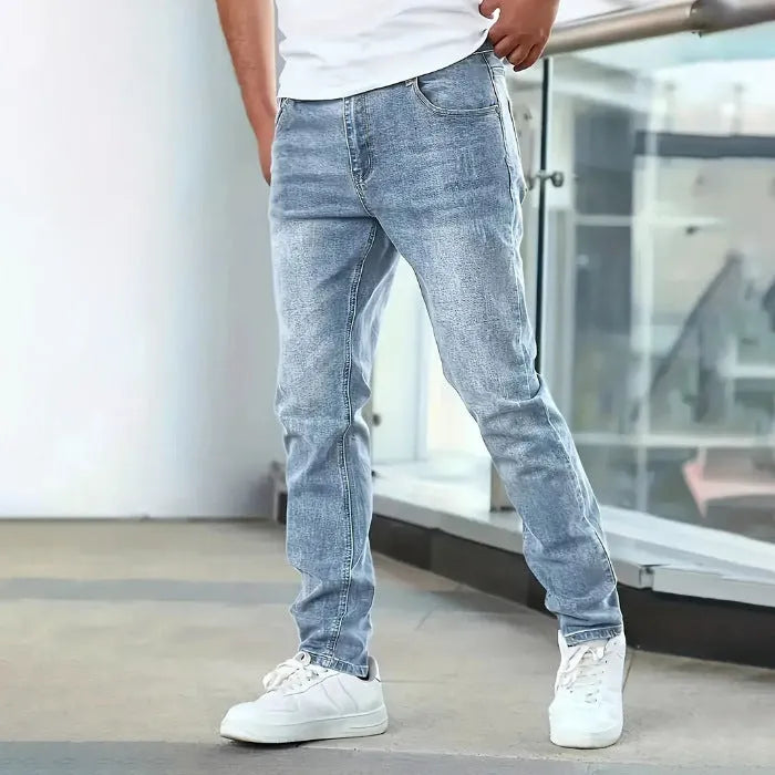 Men's slim straight stretch jeans in black cotton fabric with mid-waist and zipper fly