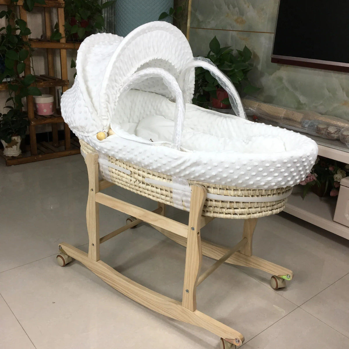 Portable multifunctional cradle bed with mosquito net and mat, in silver or white, with optional pine frame.