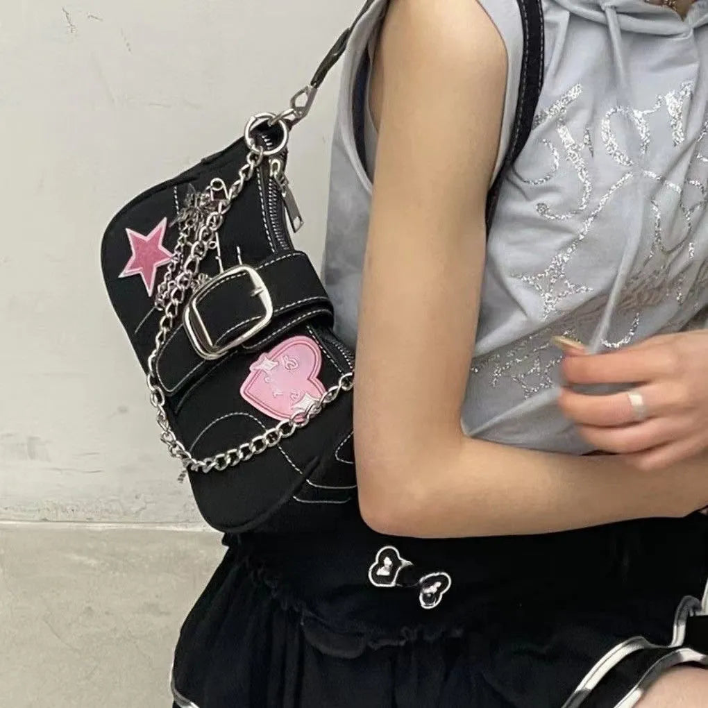 Black PU shoulder bag with bow, stitching and chain details, 25cm x 13cm x 7cm