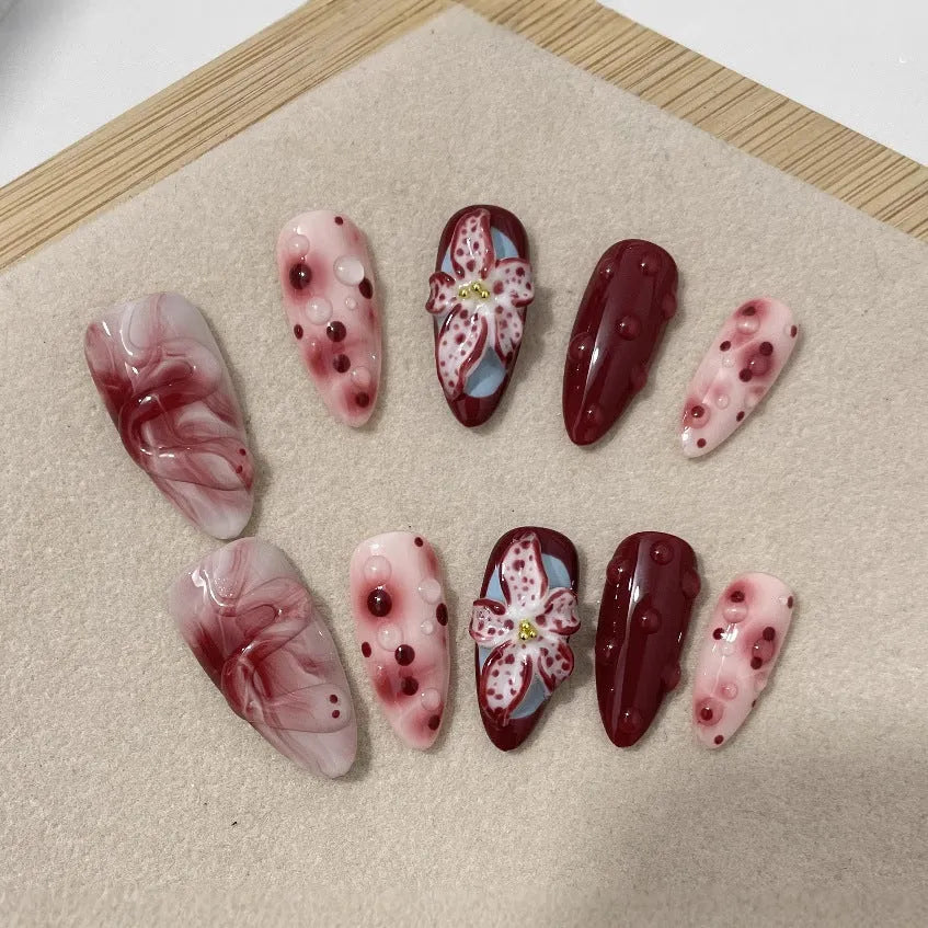 Hand-painted three-dimensional carved almond nail set with rose, tulip, shell patterns in sizes XS, S, M, L