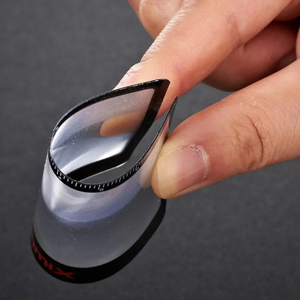 A black and white portable credit card sized plastic magnifier with 6x magnification for outdoor use.