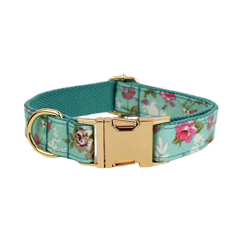 Rose pattern with green background fabric dog collar, leash, detachable bow, and vest set for pets.