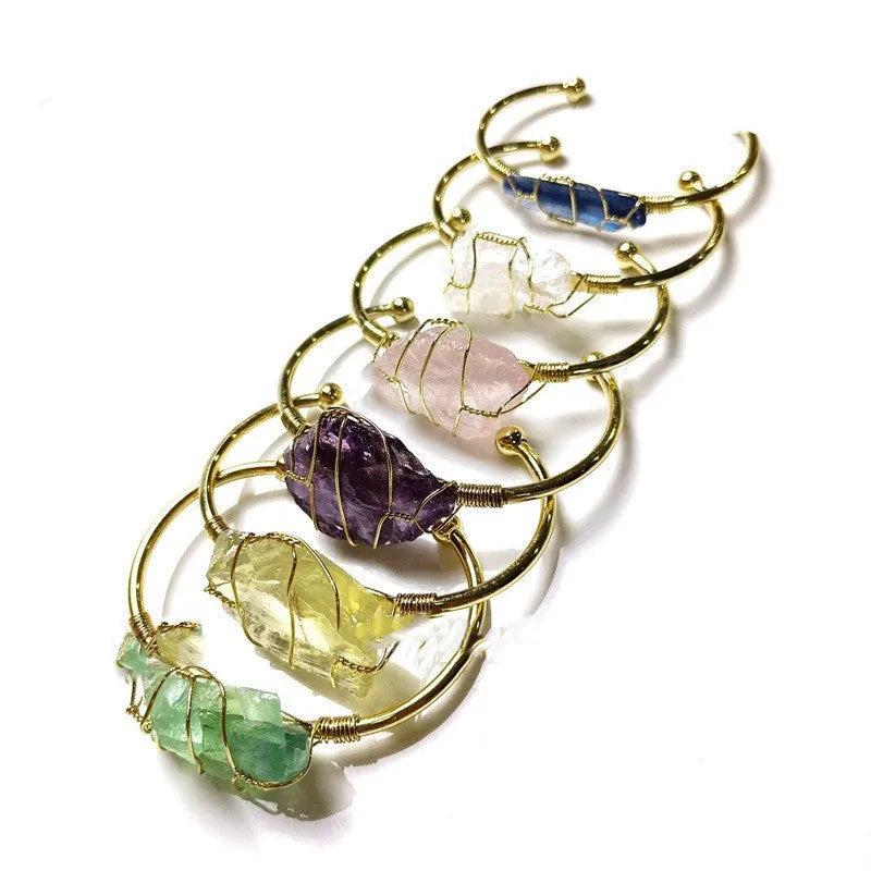 Natural crystal rough stone bracelet with geometric unshaped design and gold winding metal accents