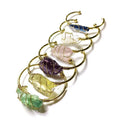 Natural crystal rough stone bracelet with geometric unshaped design and gold winding metal accents