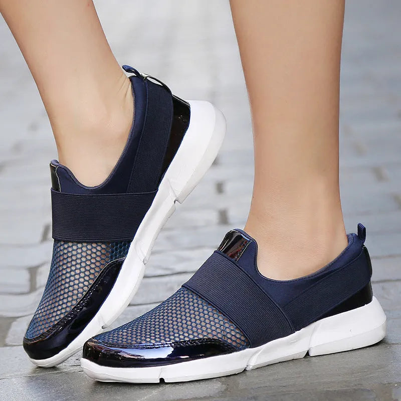 Women's lightweight sneakers with mesh inside, low tube height, and colour matching pattern in blue, black, grey