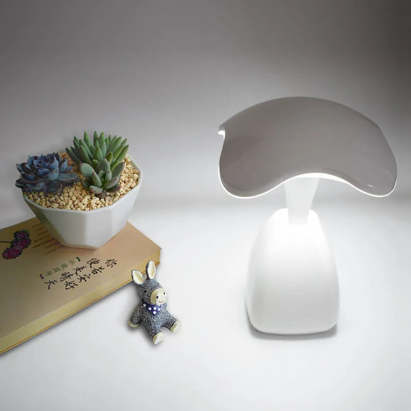 White modern LED desk lamp with touch control and plastic shade for bedside or desk use