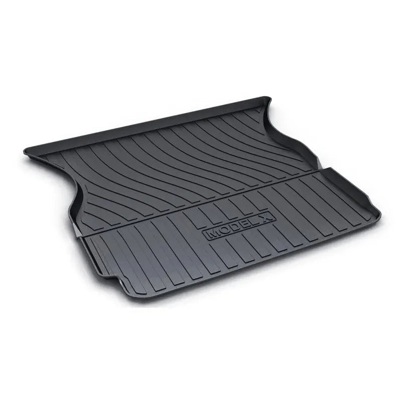 Rubber floor mats for Tesla cars with TPE footrest, custom-fit to Model 3, Y, S, X interiors, showing non-slip backing and textured surface