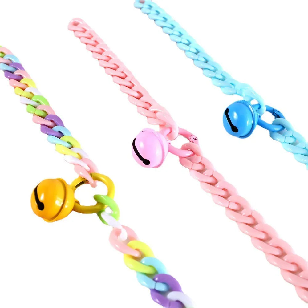 Adjustable pet collar in macaron candy colours with plastic construction and monochrome pattern