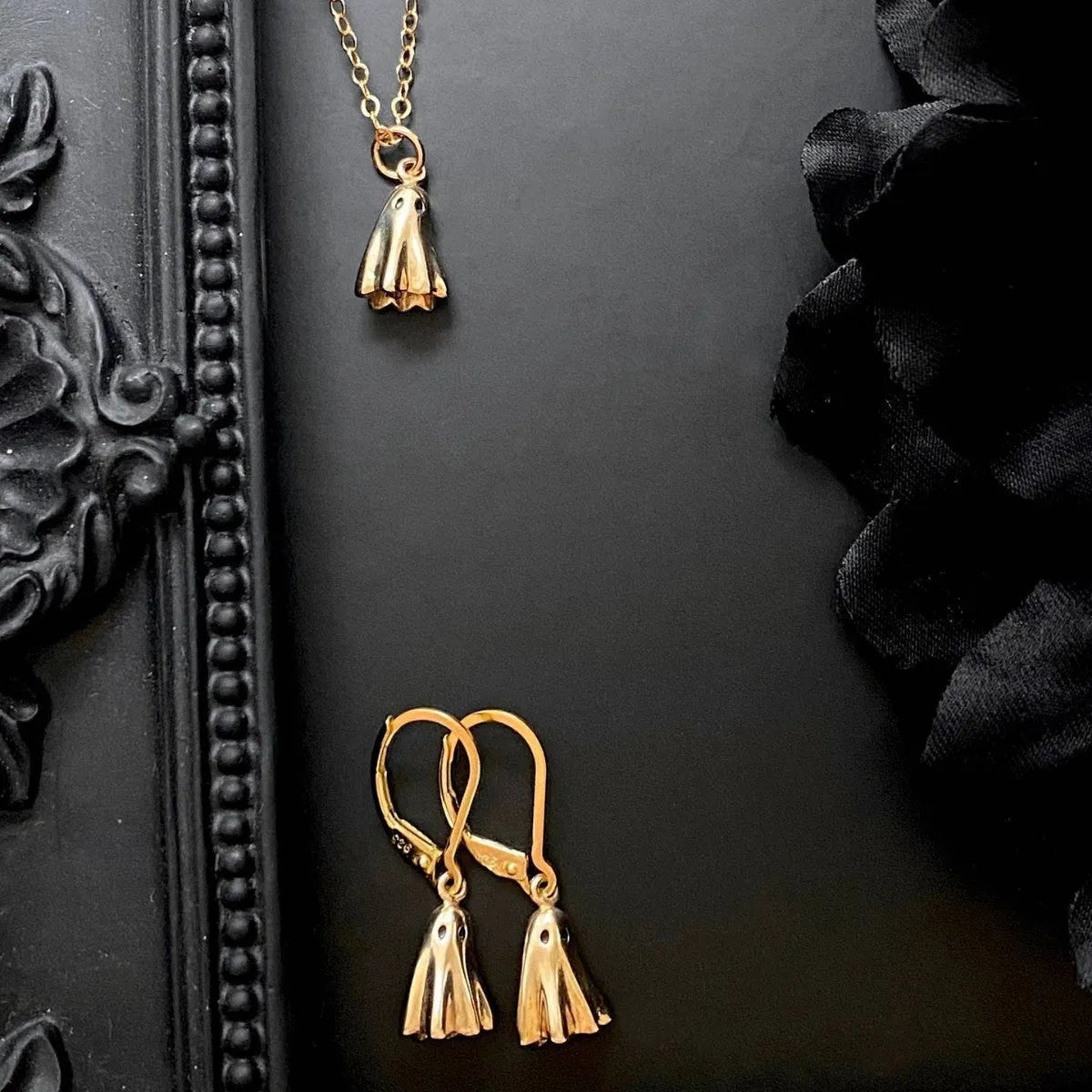 Ghost pendant necklace with titanium steel pendant and stainless steel chain in Cable, Figaro, or Mini Staple style