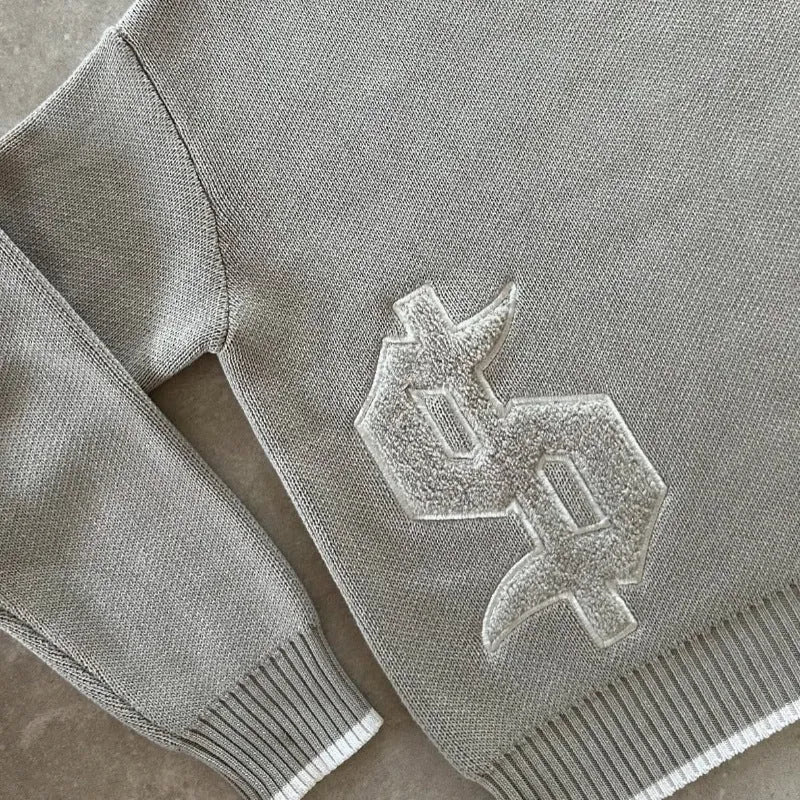 Grey loose-fitting knitwear coat with long sleeves, acetate fibre construction, pullover design for autumn winter wear