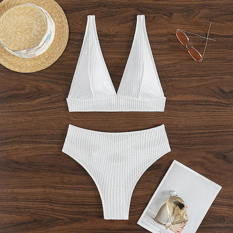 White solid colour backless bikini swimsuit for women on a mannequin