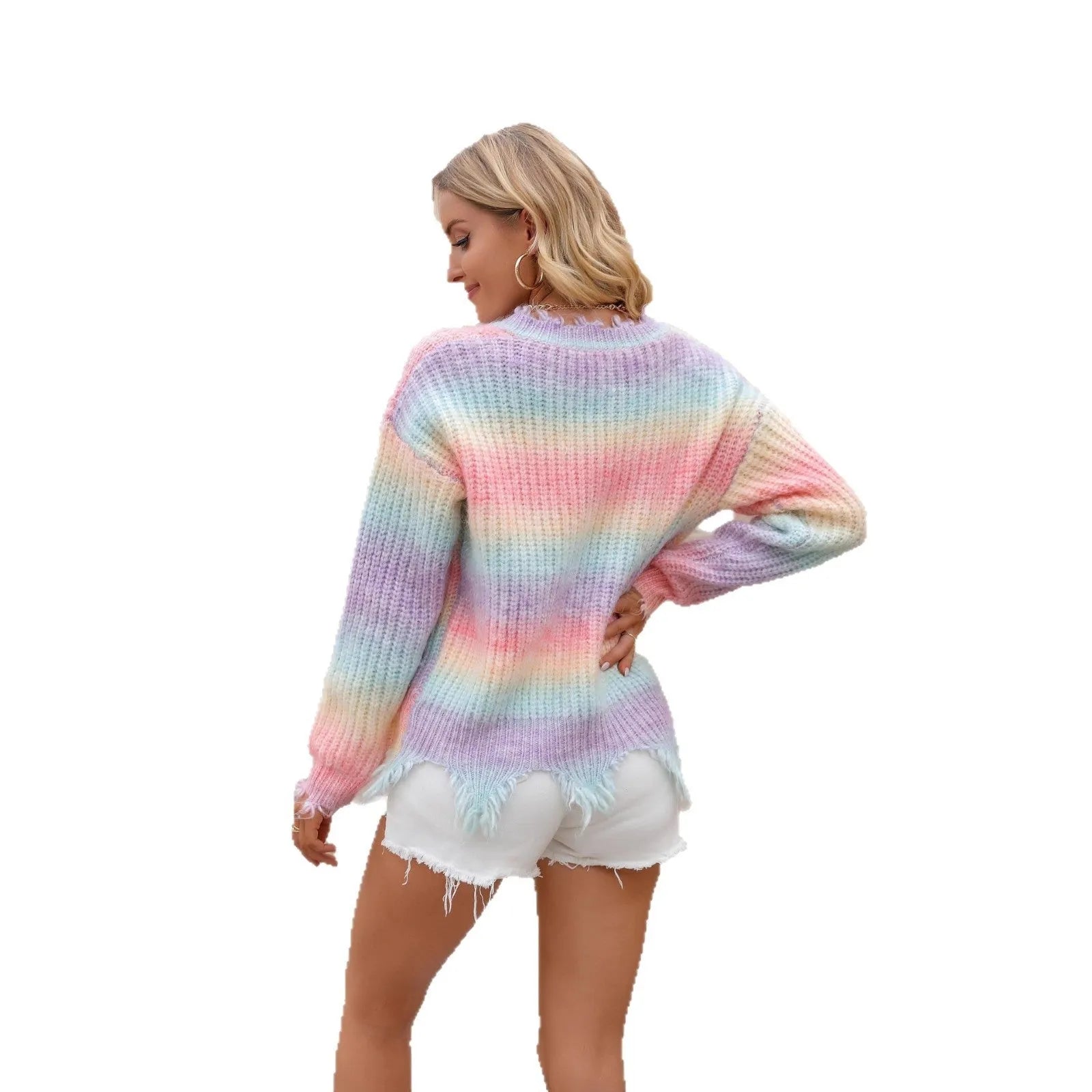 Pink knitted pullover sweater with a gradient rainbow pattern and loose, relaxed fit.