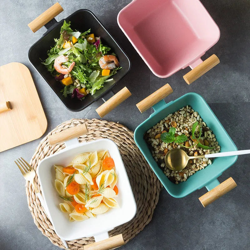 Ceramic serving bowl with lid in irregular modern shape, heat-resistant porcelain construction