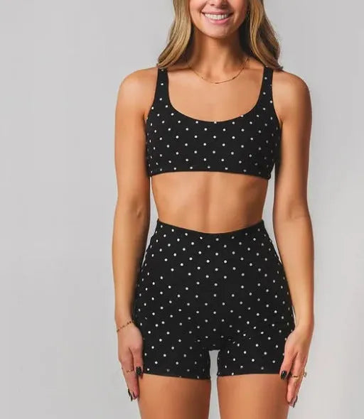 Black wave point two piece swimsuit set with sleeveless top and fifth pants, sizes XS to 2XL