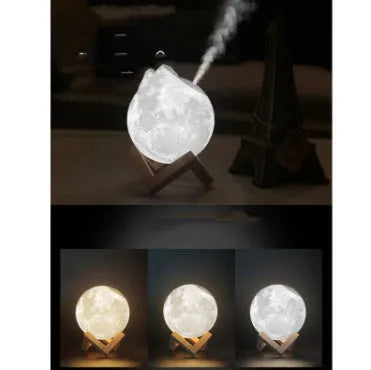 Spherical white lunar humidifier and night light with USB charging port and soft LED glow.
