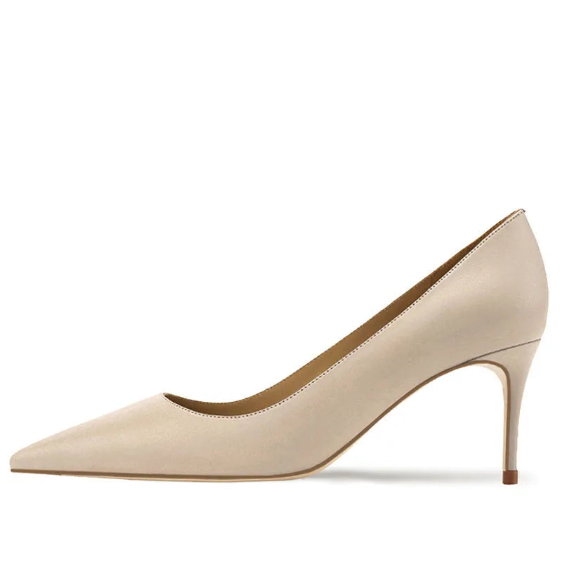 French women's black pointed-toe high-heeled shoes with a soft sole and slip-on kick closure.