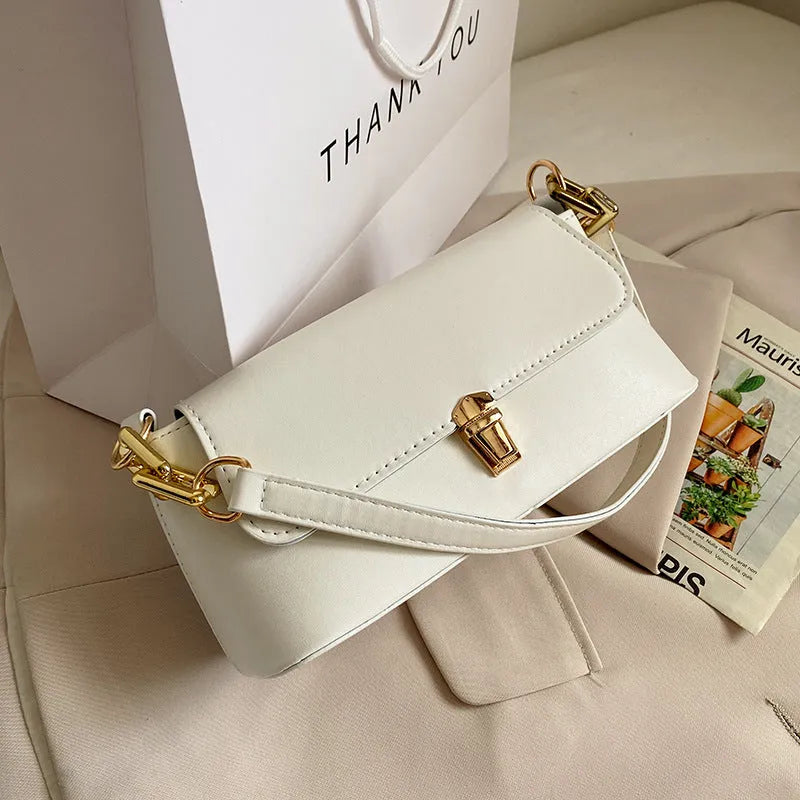 French casual brown PU underarm shoulder bag with chain strap and horizontal square sandwich pocket design.