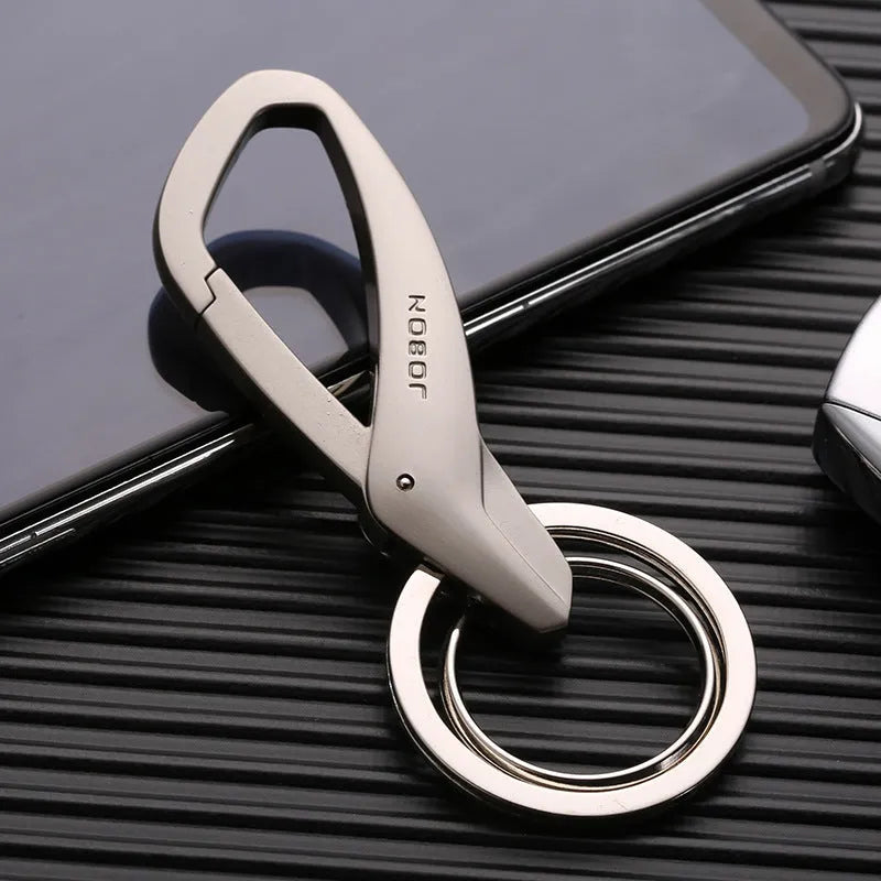 Zinc alloy double ring car key chain measuring 8.3x3.5cm in black, chrome, and nickel finishes