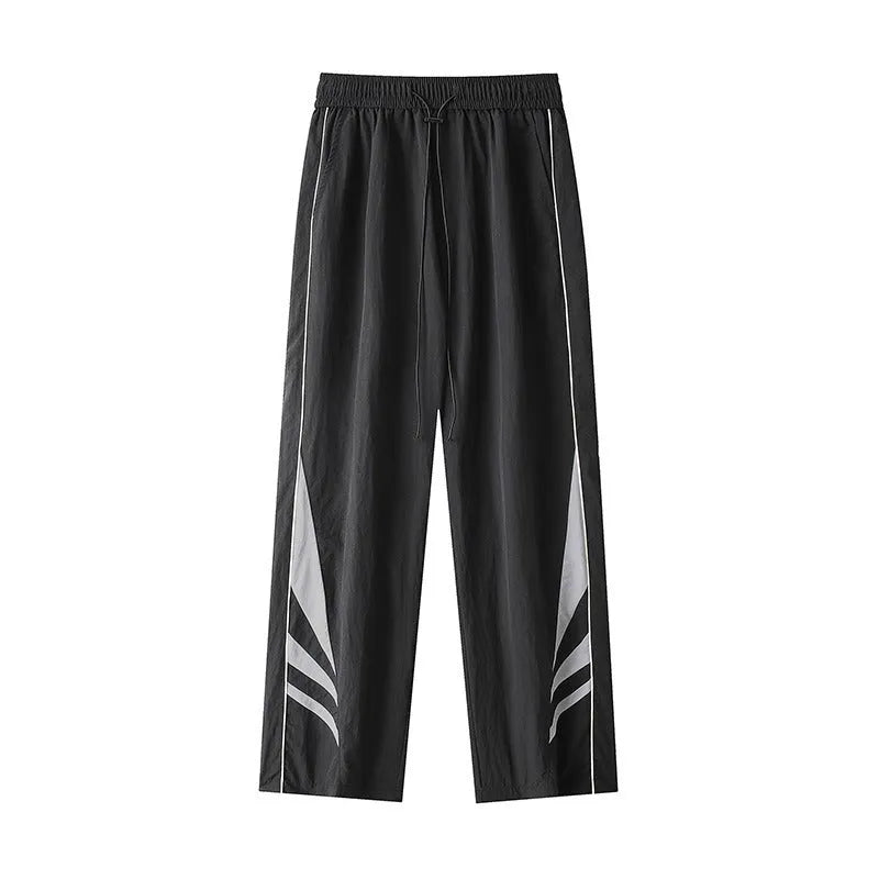 Straight-leg cotton blend trousers in black or grey with button fly and mid-waist design