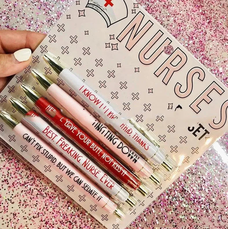 Five nurse theme ballpoint pens with humorous decoration arranged together