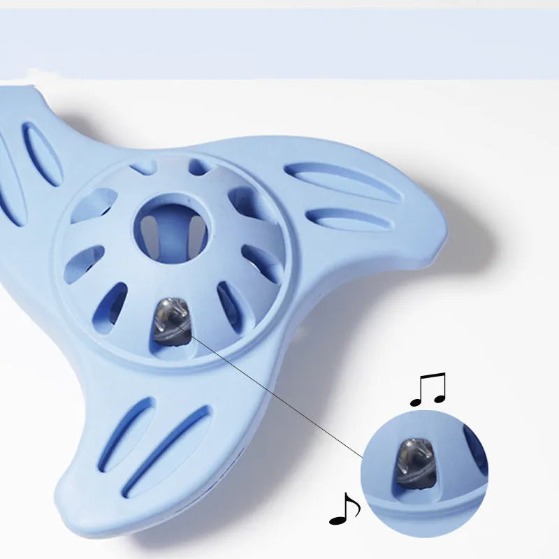 Blue boomerang-shaped dog toy with molar texture, measuring 132mm