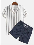 Men's light blue polyester beach suit set with short sleeve shirt and matching shorts on a hanger.
