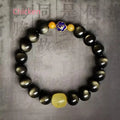 Golden obsidian bracelet with hand-carved Chinese zodiac animal beads in geometric shapes