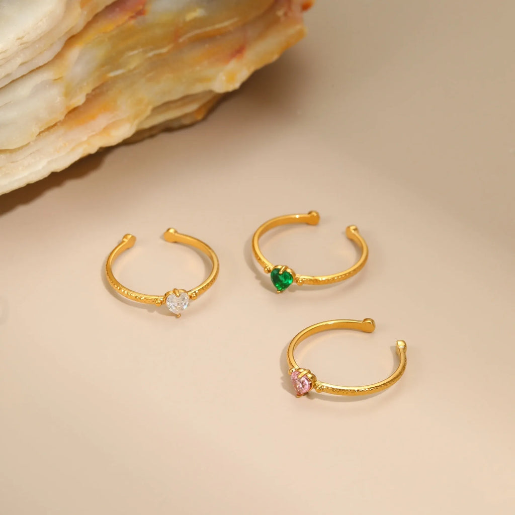 Open ended heart ring with zircon stones in stainless steel, showing adjustable free size design